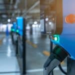 Blur,Photo,Of,Electric,Car,Charging,Station,For,Charge,Ev